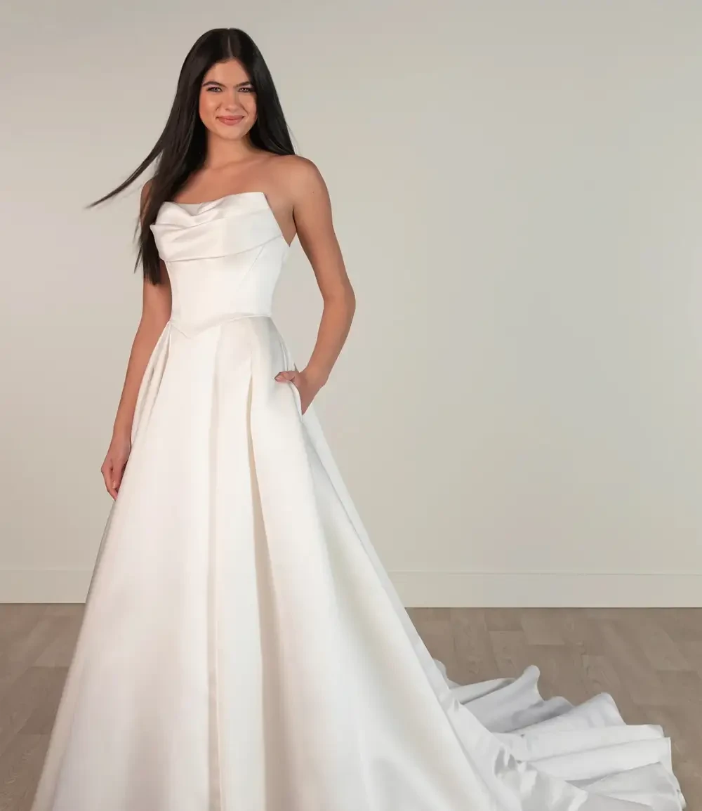 Model wearing a gown by Stella York